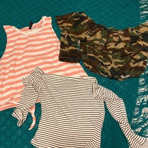 Bundle of three shirt. Between Medium and Large size fit .